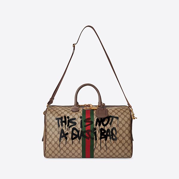 バレンシアガ*ハッカー プロジェクト 偽物 グラフィティ ミディアム キャンバス ダッフルバッグ 6801242104T1169 バレンシアガ*ハッカー プロジェクト 偽物 グラフィティ ミディアム キャンバス ダッフルバッグ 6801242104T1169